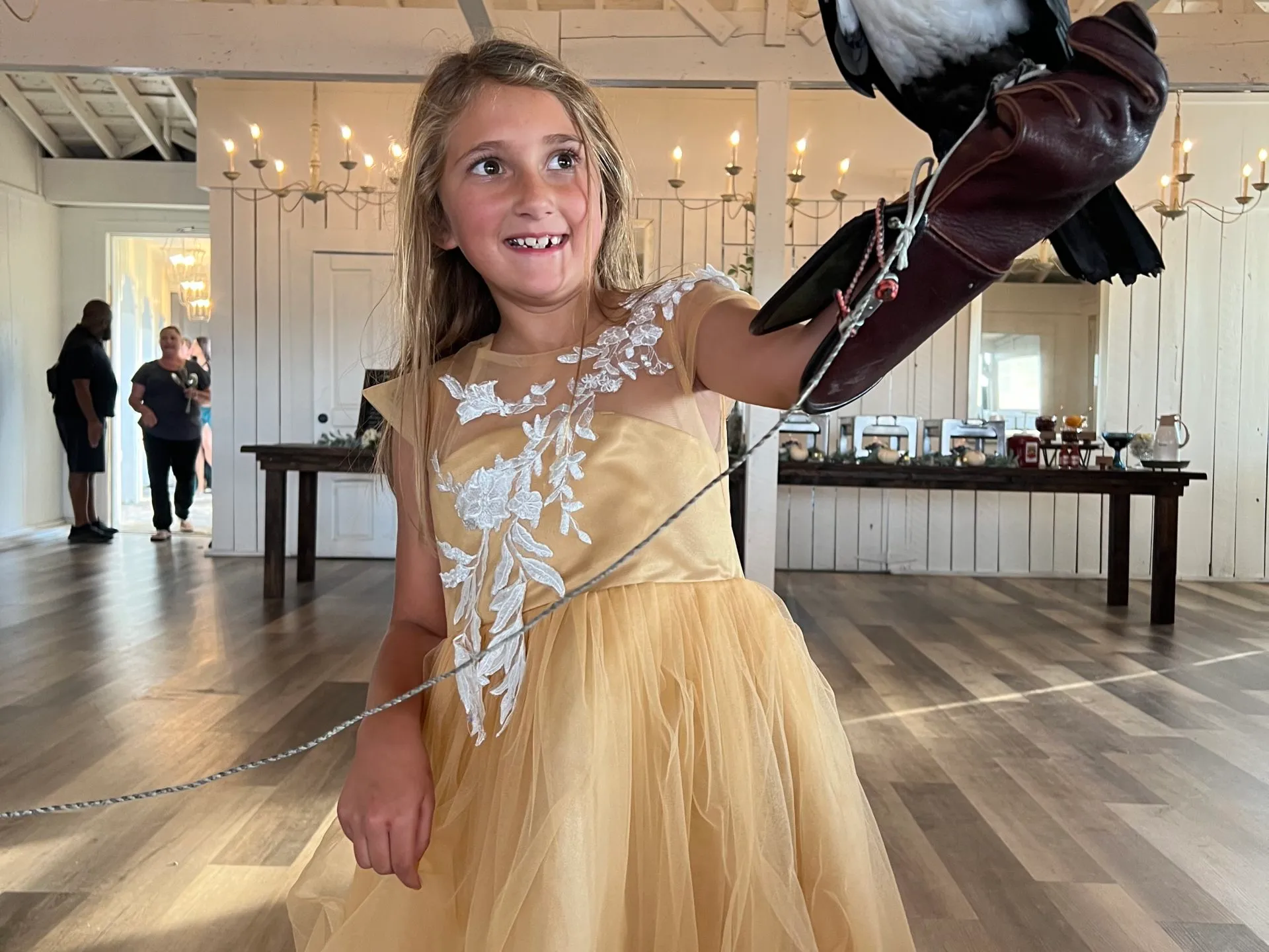 a person holding a bird